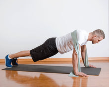 Load image into Gallery viewer, The industry standard in rehabilitation aid and physiotherapy, Coresteady Resistance Therapy bands provide safe and effective workouts that allow you to be in total control of every movement. Male exercising press pushups.