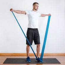 Load image into Gallery viewer, The industry standard in rehabilitation aid and physiotherapy, Coresteady Resistance Therapy bands provide safe and effective workouts that allow you to be in total control of every movement. Male exercising lateral raise.