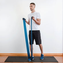 Load image into Gallery viewer, The industry standard in rehabilitation aid and physiotherapy, Coresteady Resistance Therapy bands provide safe and effective workouts that allow you to be in total control of every movement. Male exercising arm double arm curl.
