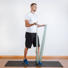 Load image into Gallery viewer, The industry standard in rehabilitation aid and physiotherapy, Coresteady Resistance Therapy bands provide safe and effective workouts that allow you to be in total control of every movement. Male exercising arm double arm curls.
